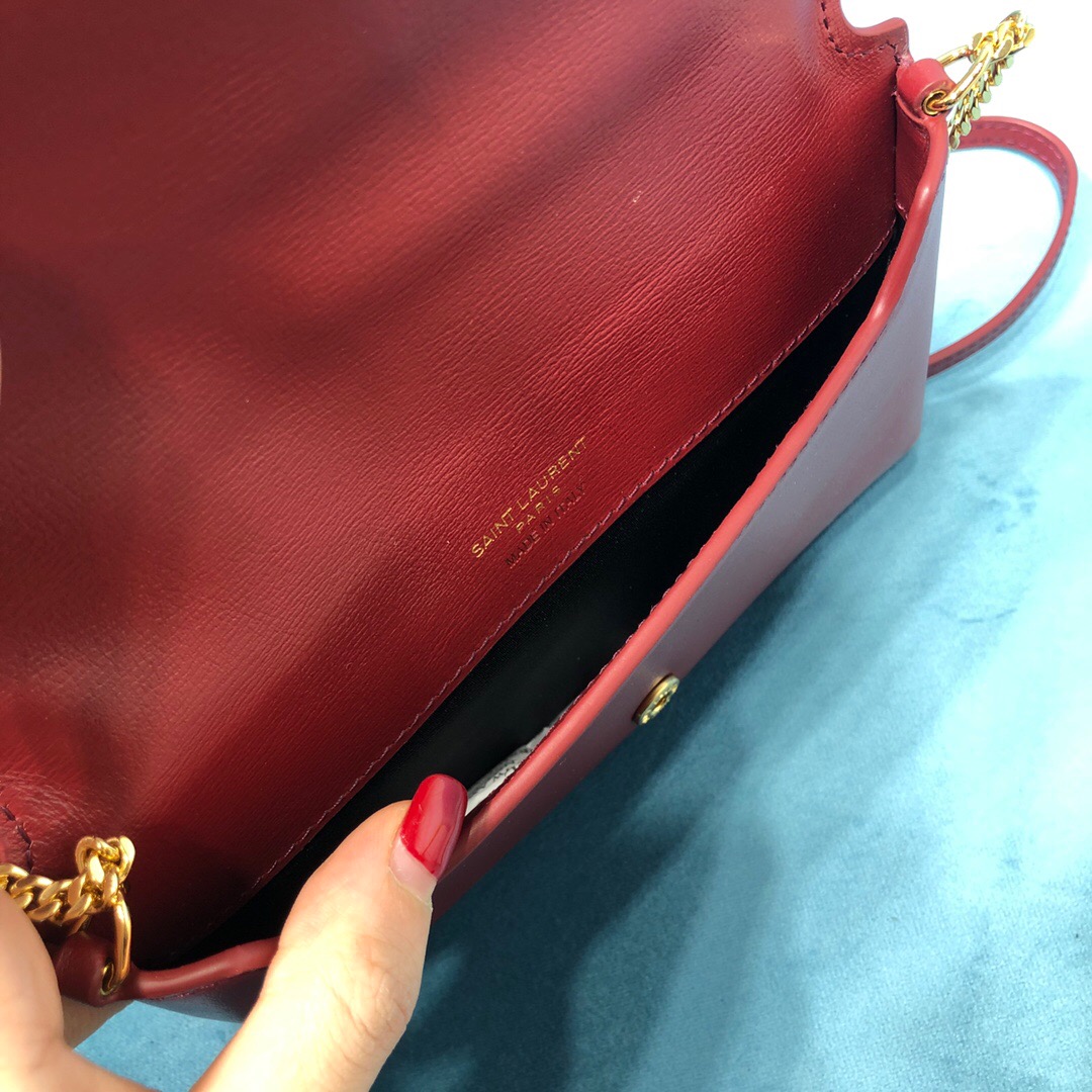 YSL CASSANDRE PHONE HOLDER WITH STRAP