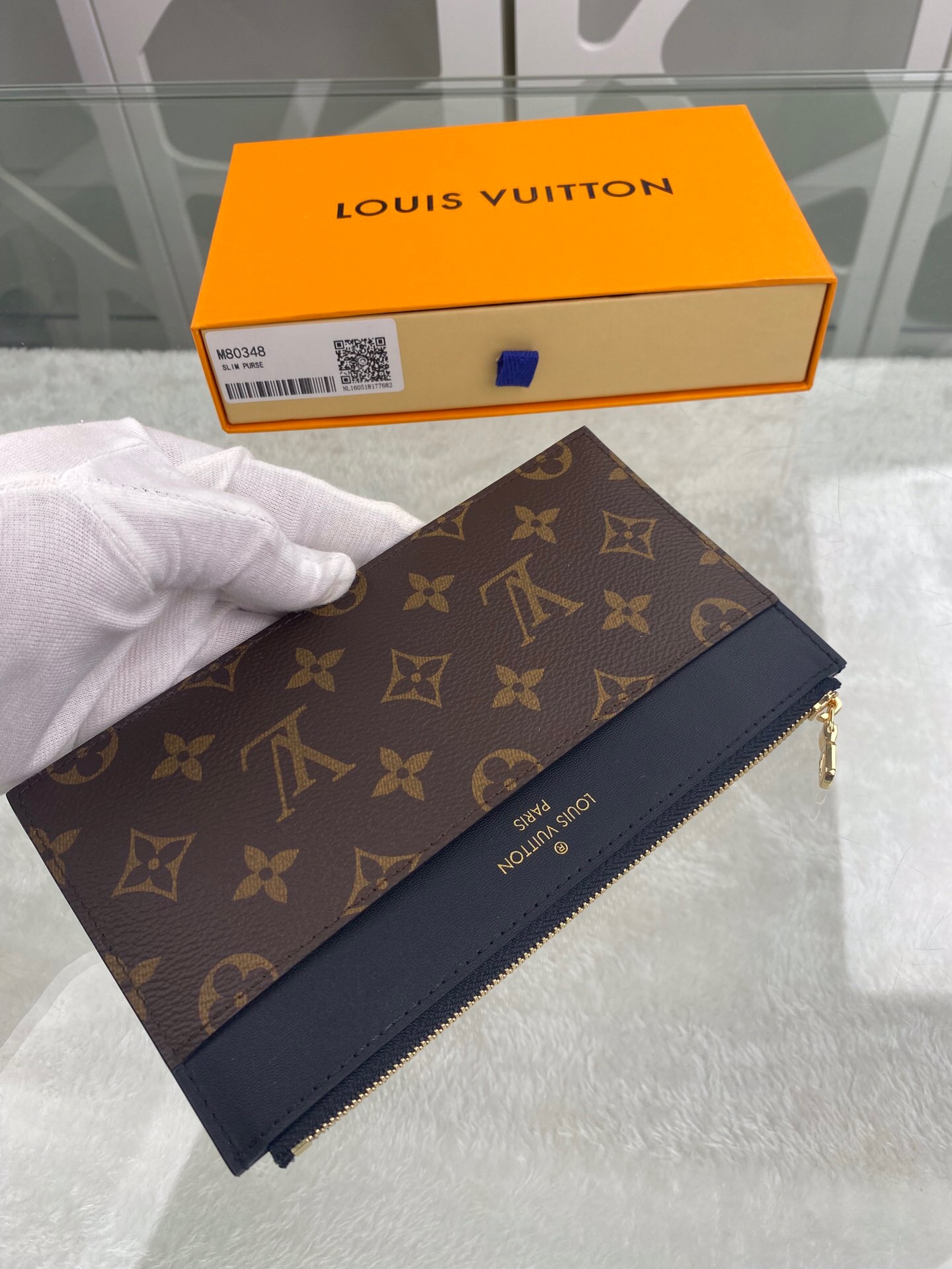 l**is V*t*n wallet
