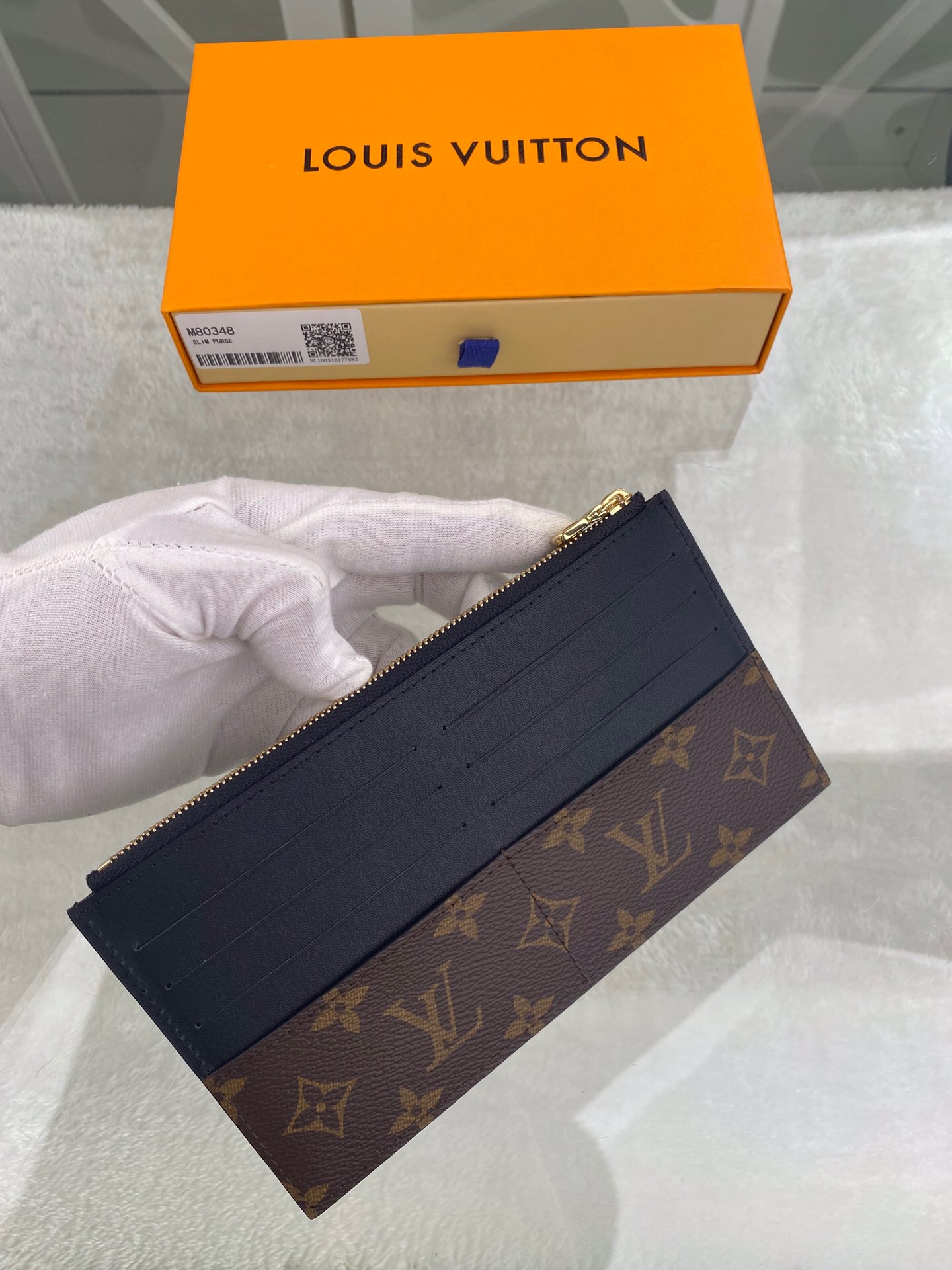 l**is V*t*n wallet