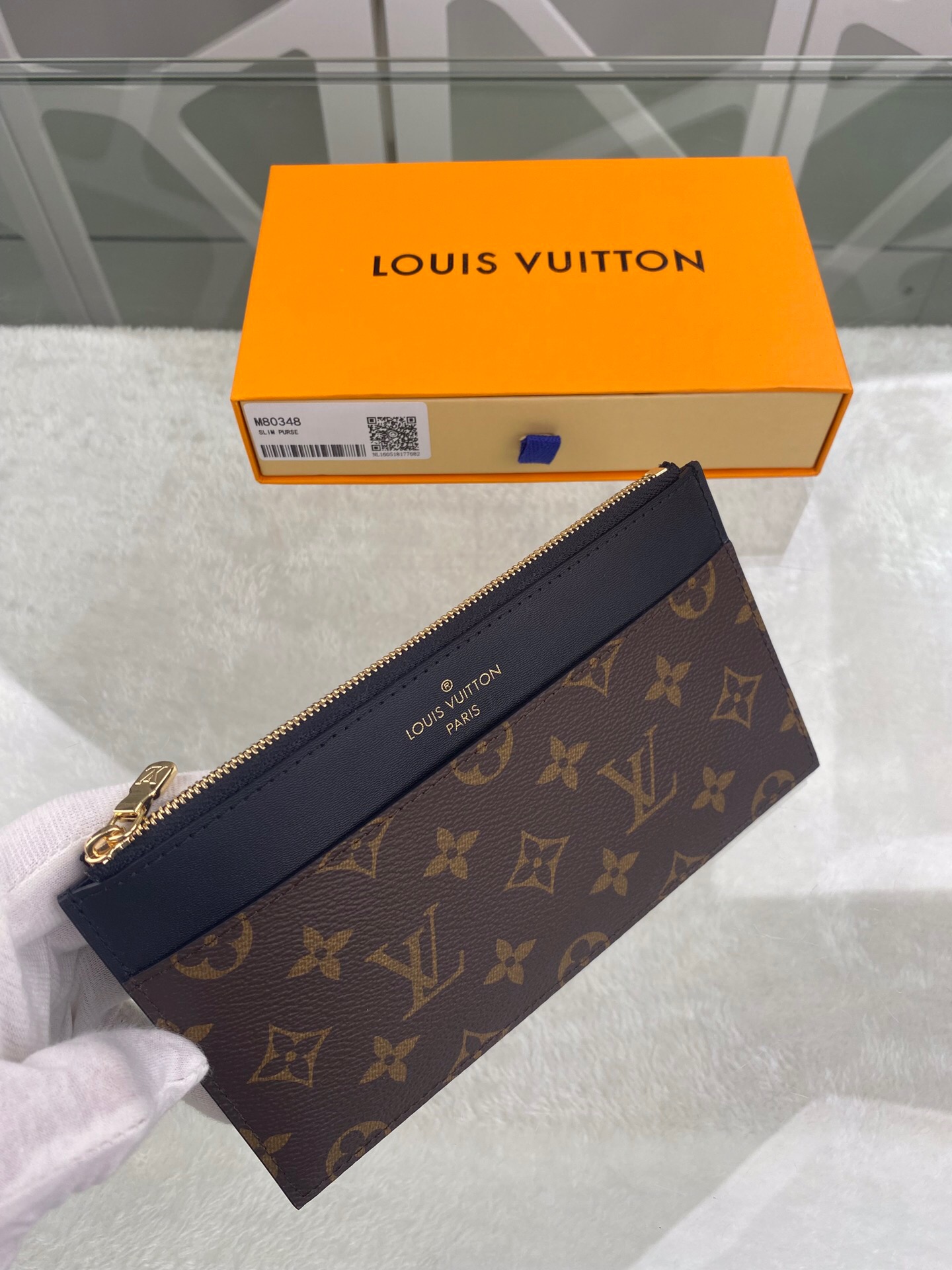 l**is V*t*n wallet