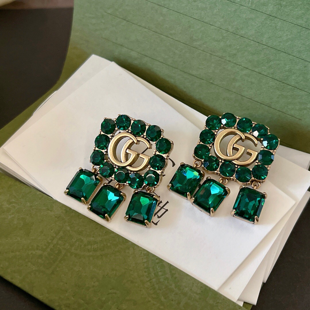 G*u*i earring