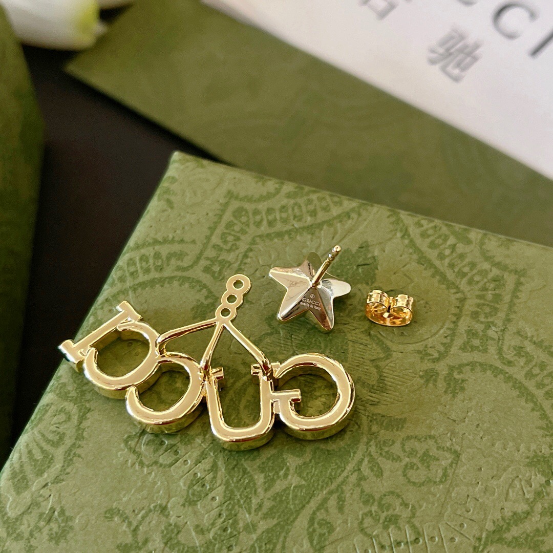 G*u*i earring