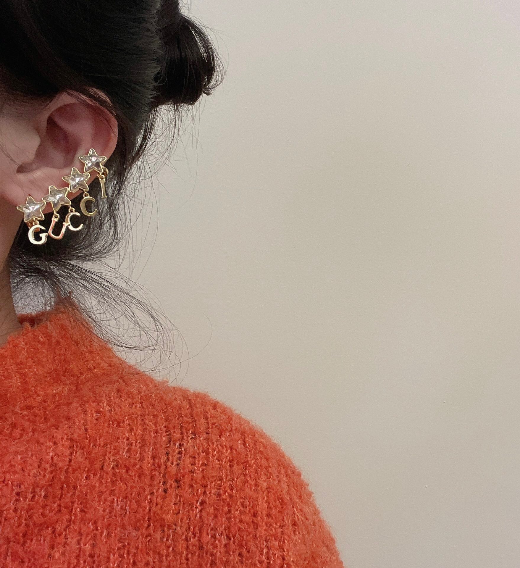 G*u*i earring