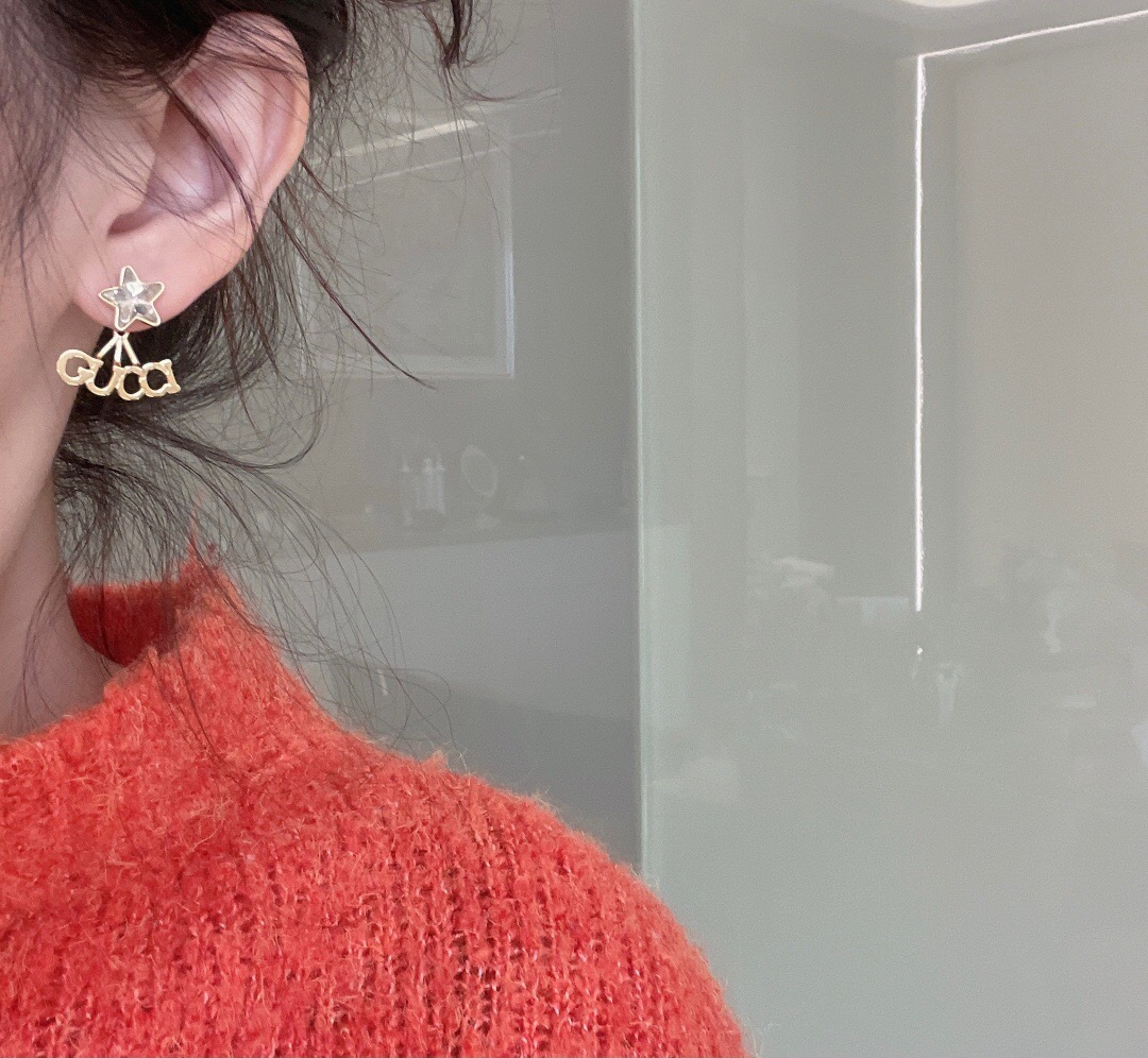 G*u*i earring