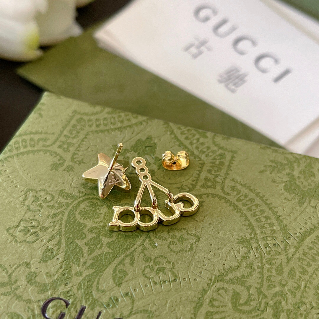 G*u*i earring