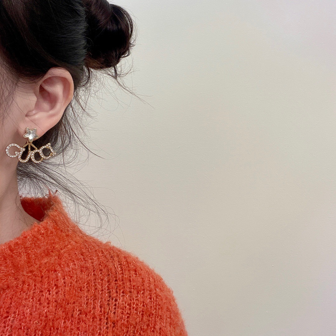 G*u*i earring