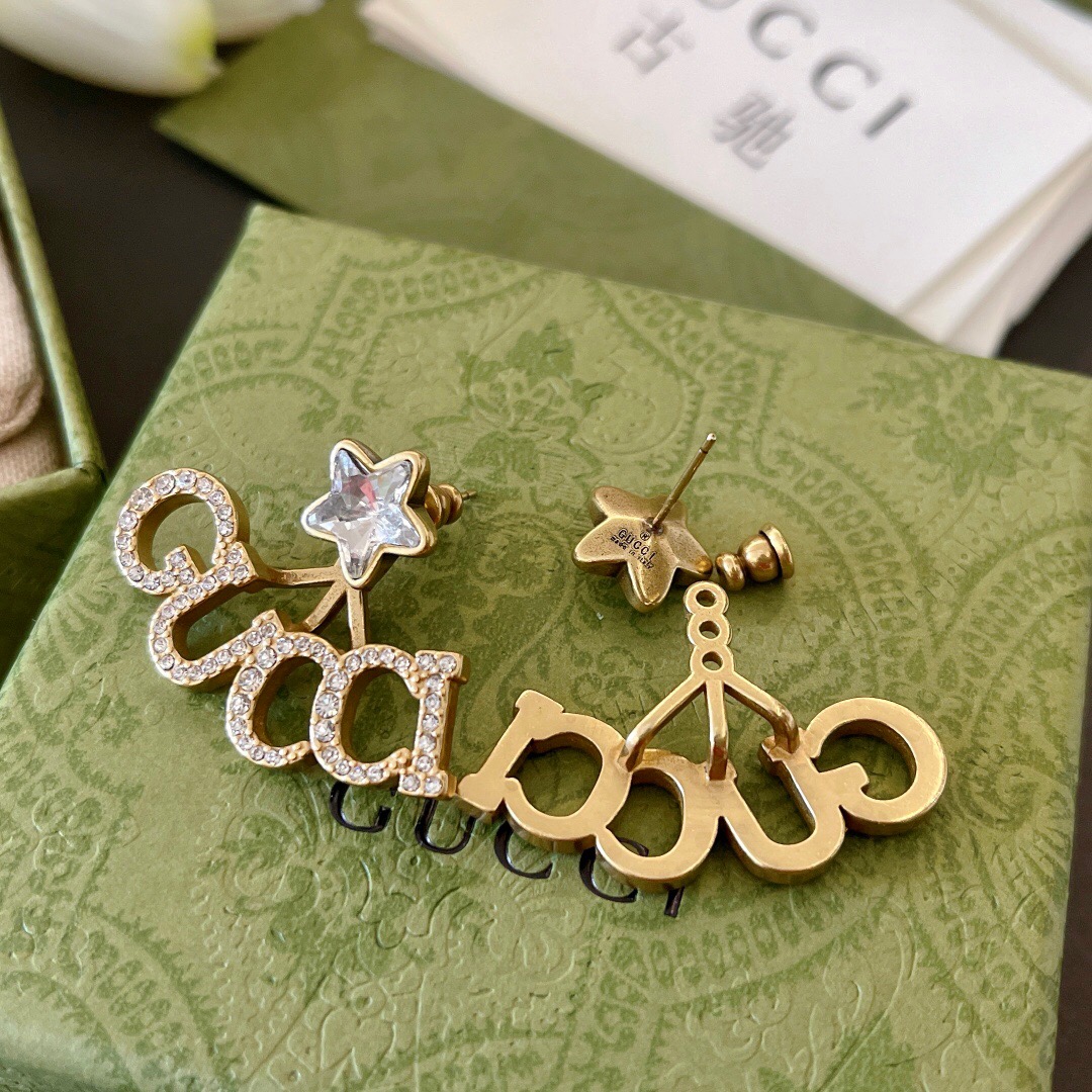 G*u*i earring