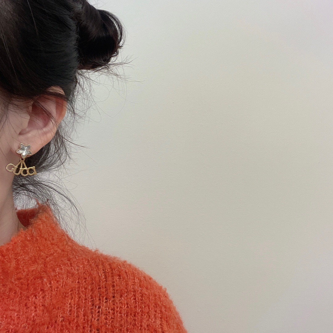 G*u*i earring