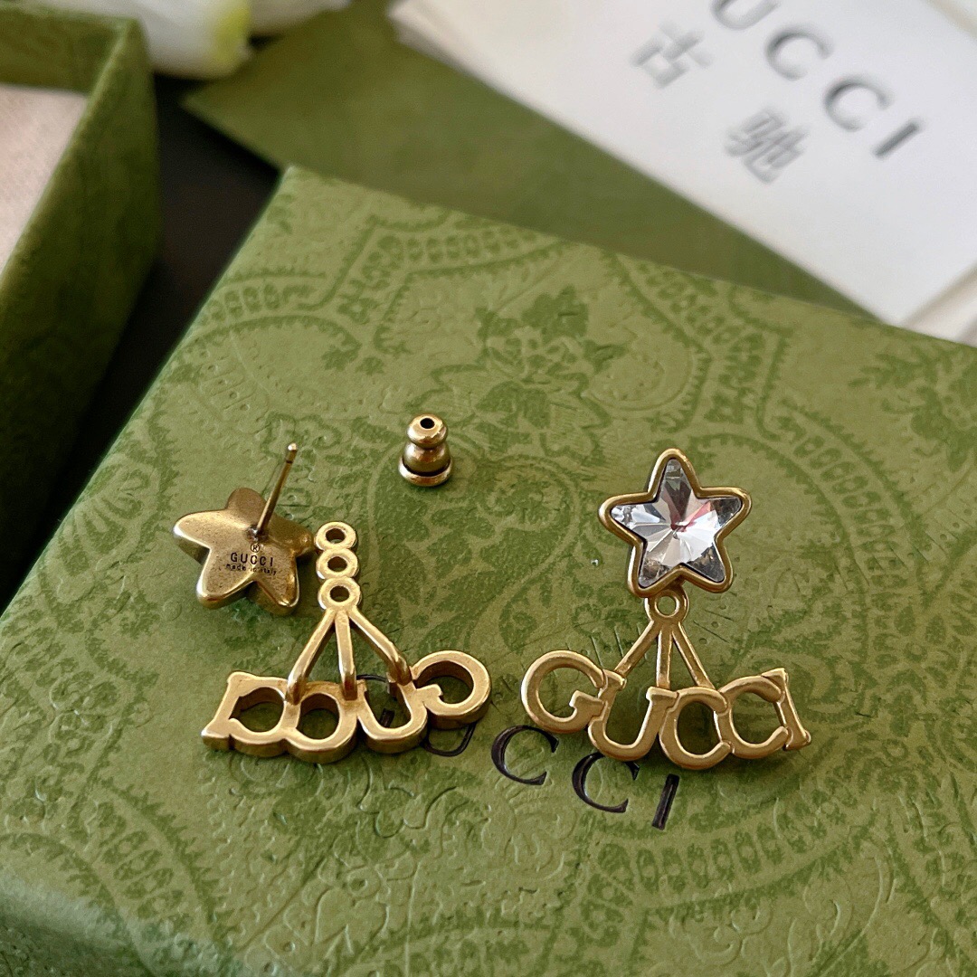 G*u*i earring