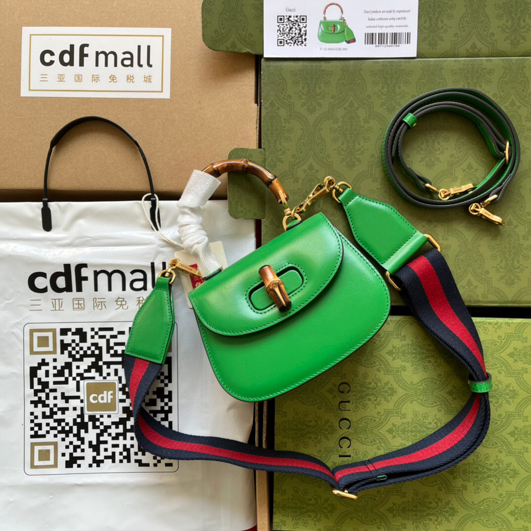 G*u*i bamboo handle bag