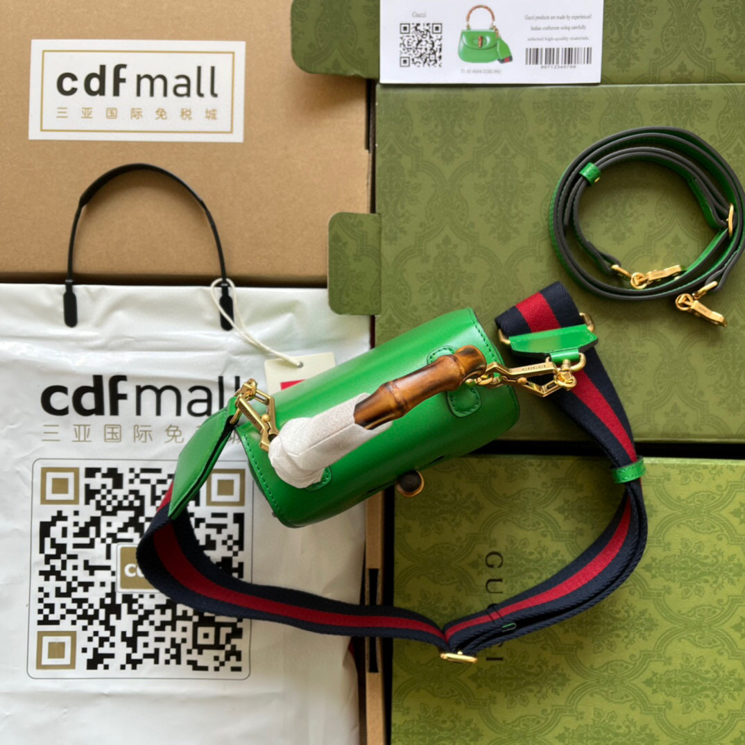 G*u*i bamboo handle bag