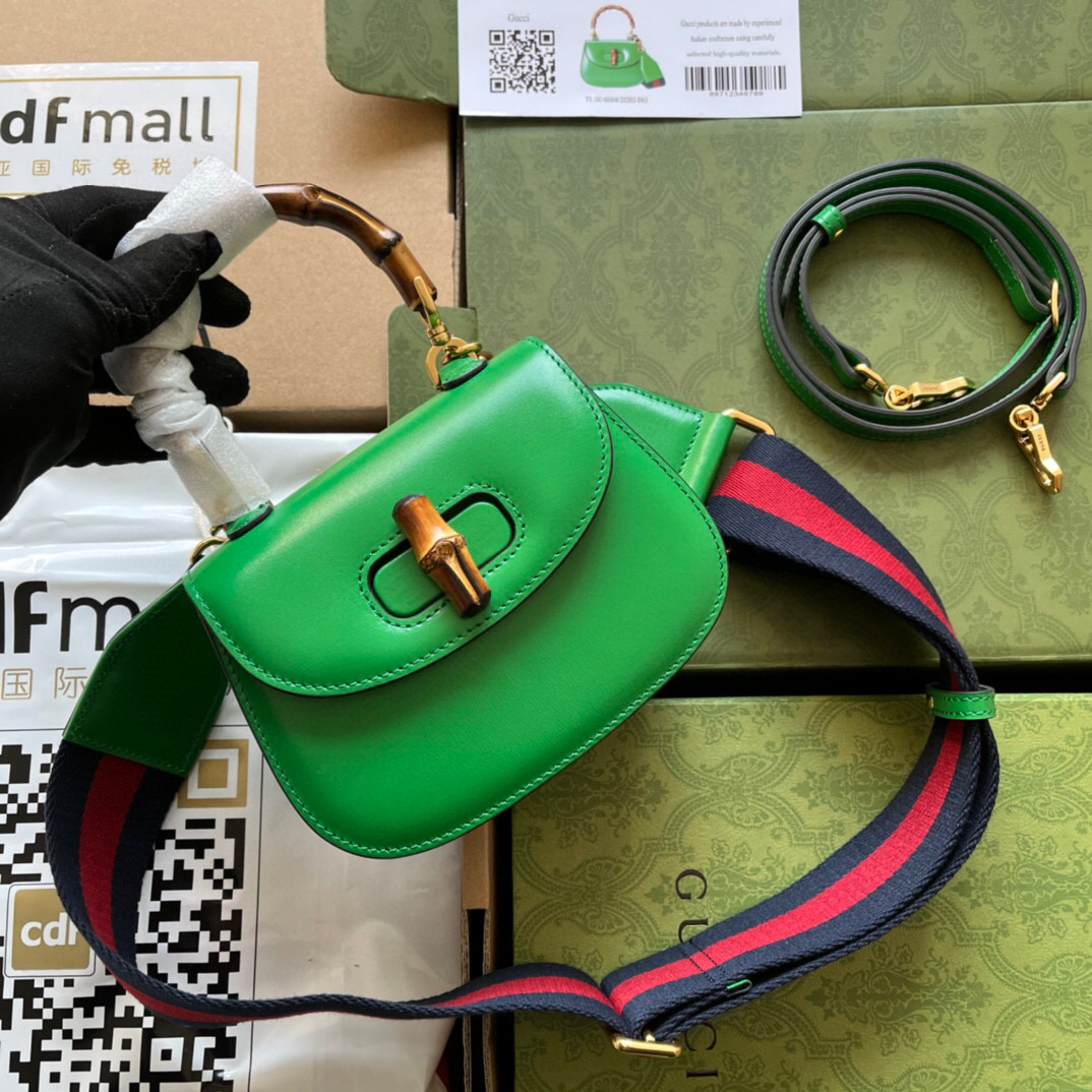 G*u*i bamboo handle bag