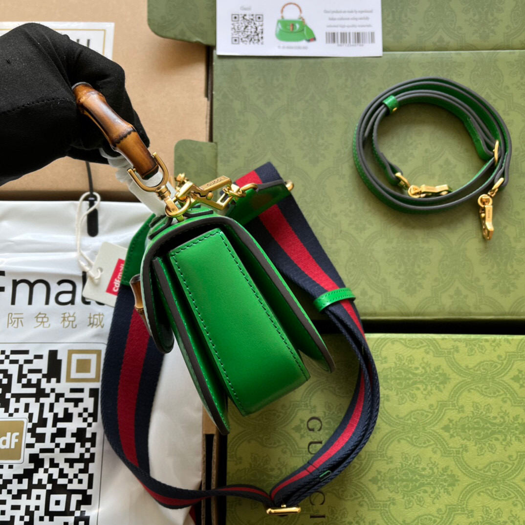G*u*i bamboo handle bag