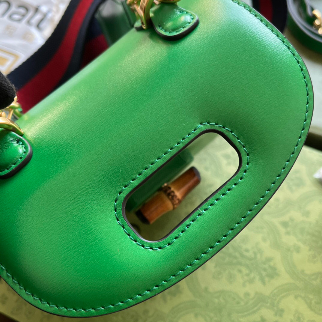 G*u*i bamboo handle bag