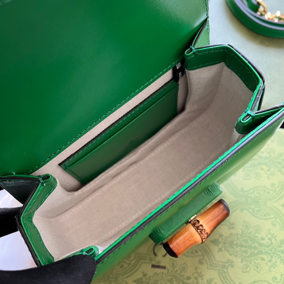 G*u*i bamboo handle bag