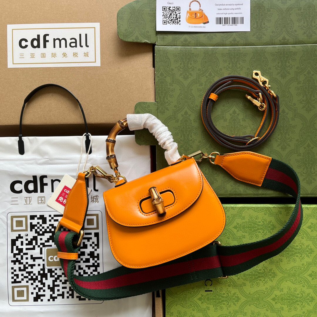 G*u*i bamboo handle bag