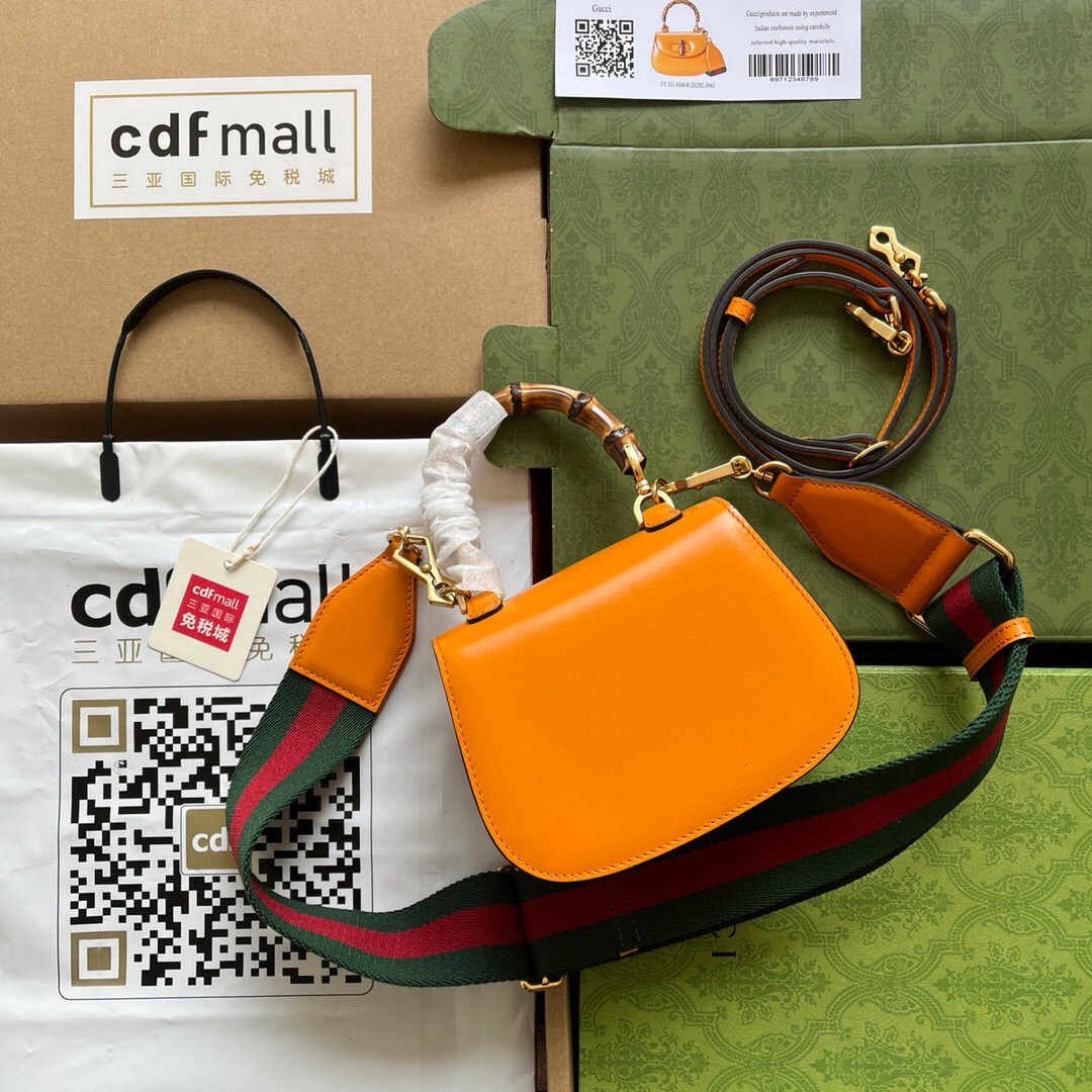 G*u*i bamboo handle bag