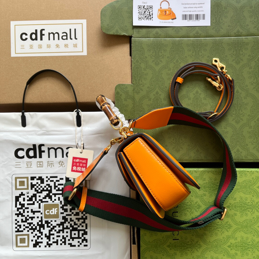 G*u*i bamboo handle bag