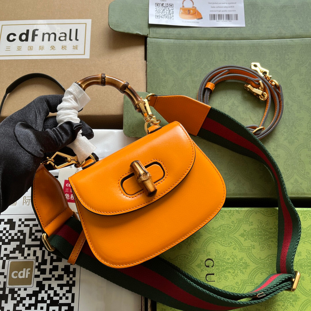 G*u*i bamboo handle bag