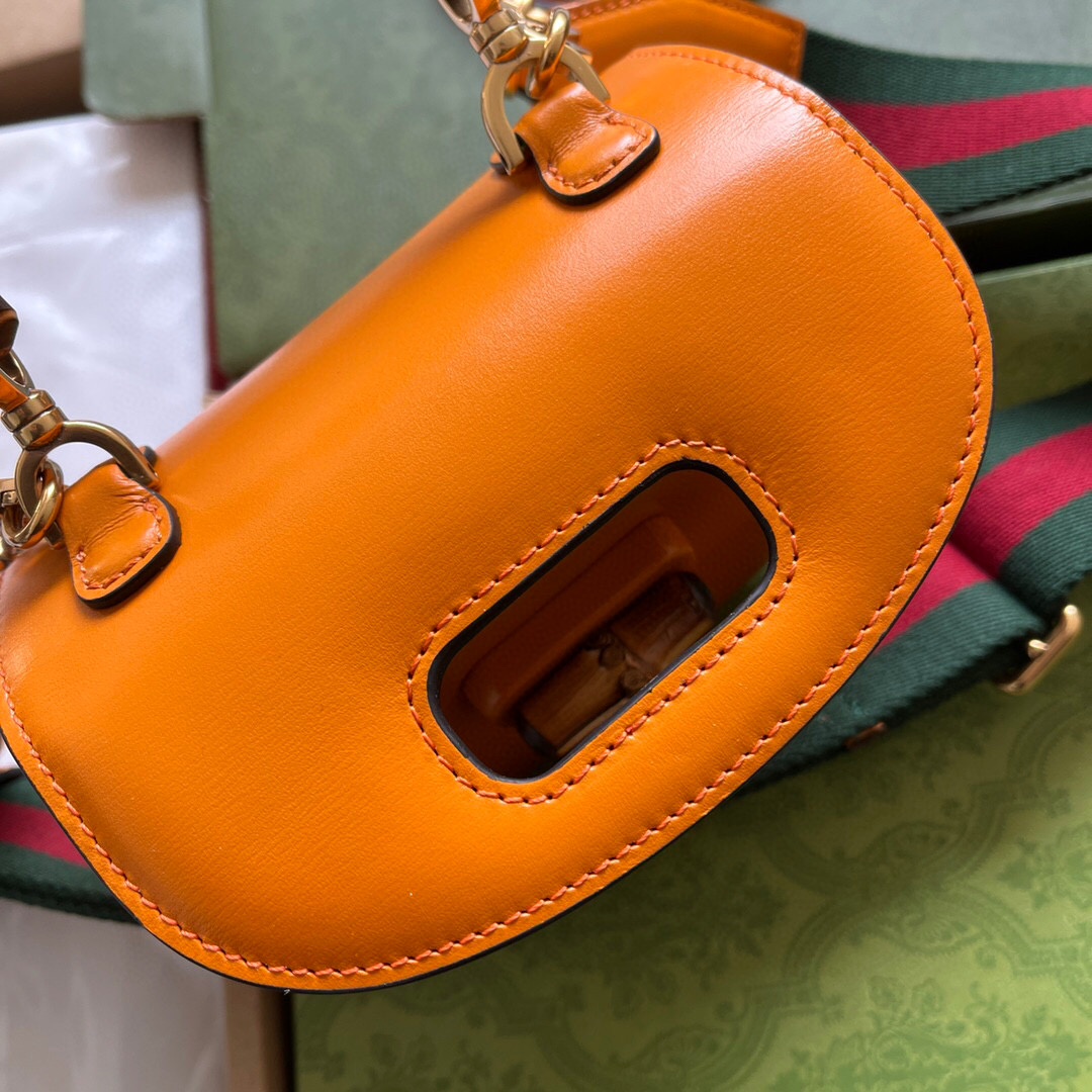 G*u*i bamboo handle bag