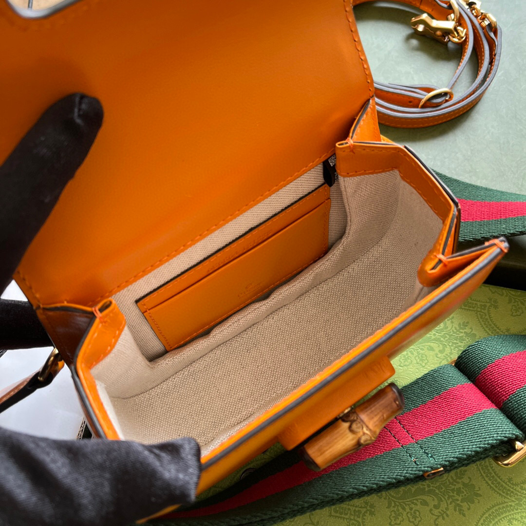 G*u*i bamboo handle bag