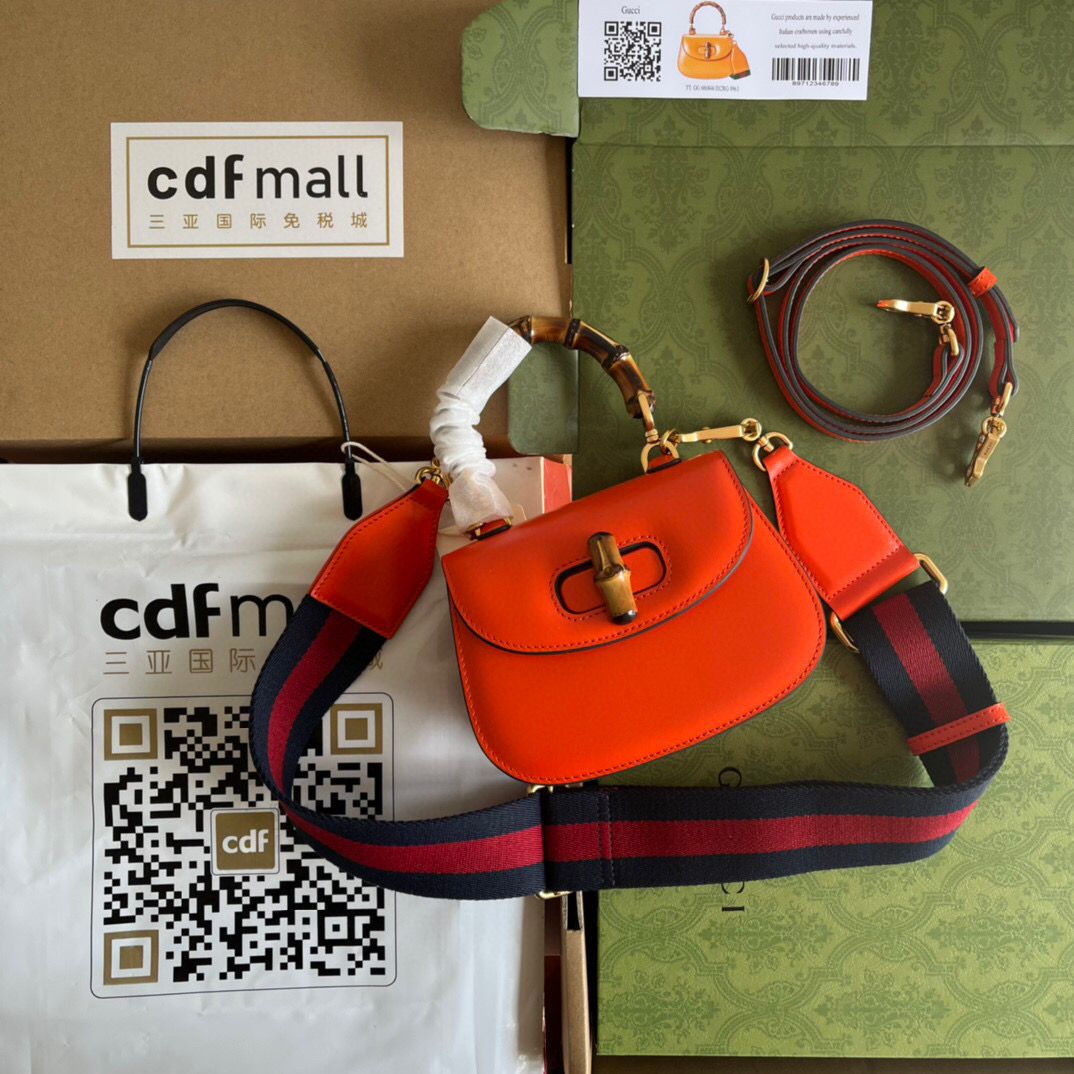 G*u*i bamboo handle bag