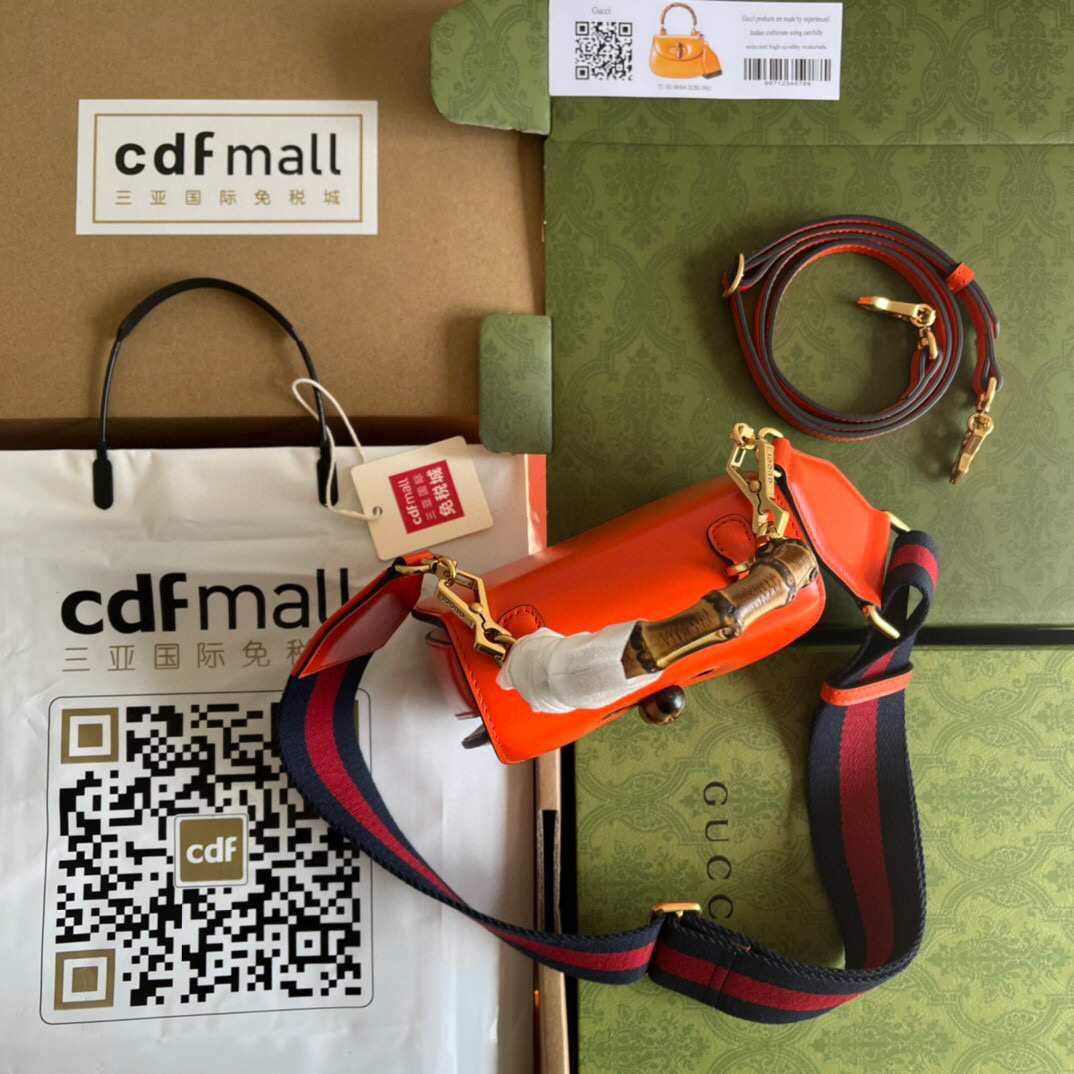 G*u*i bamboo handle bag