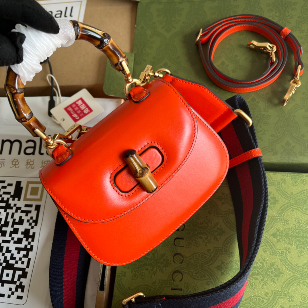 G*u*i bamboo handle bag