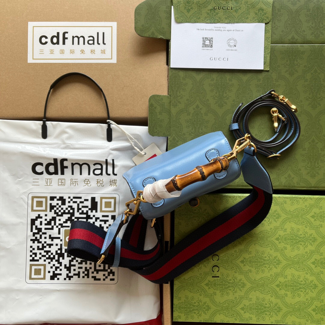 G*u*i bamboo handle bag