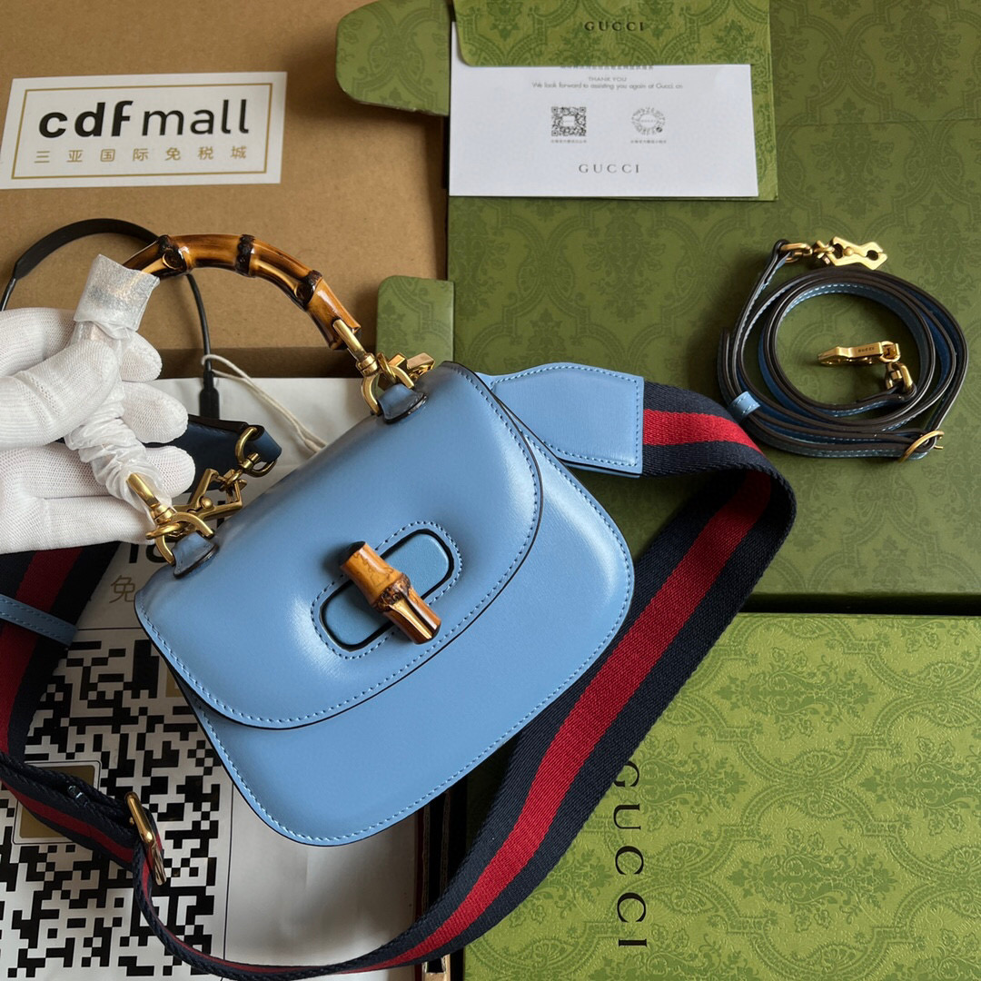 G*u*i bamboo handle bag