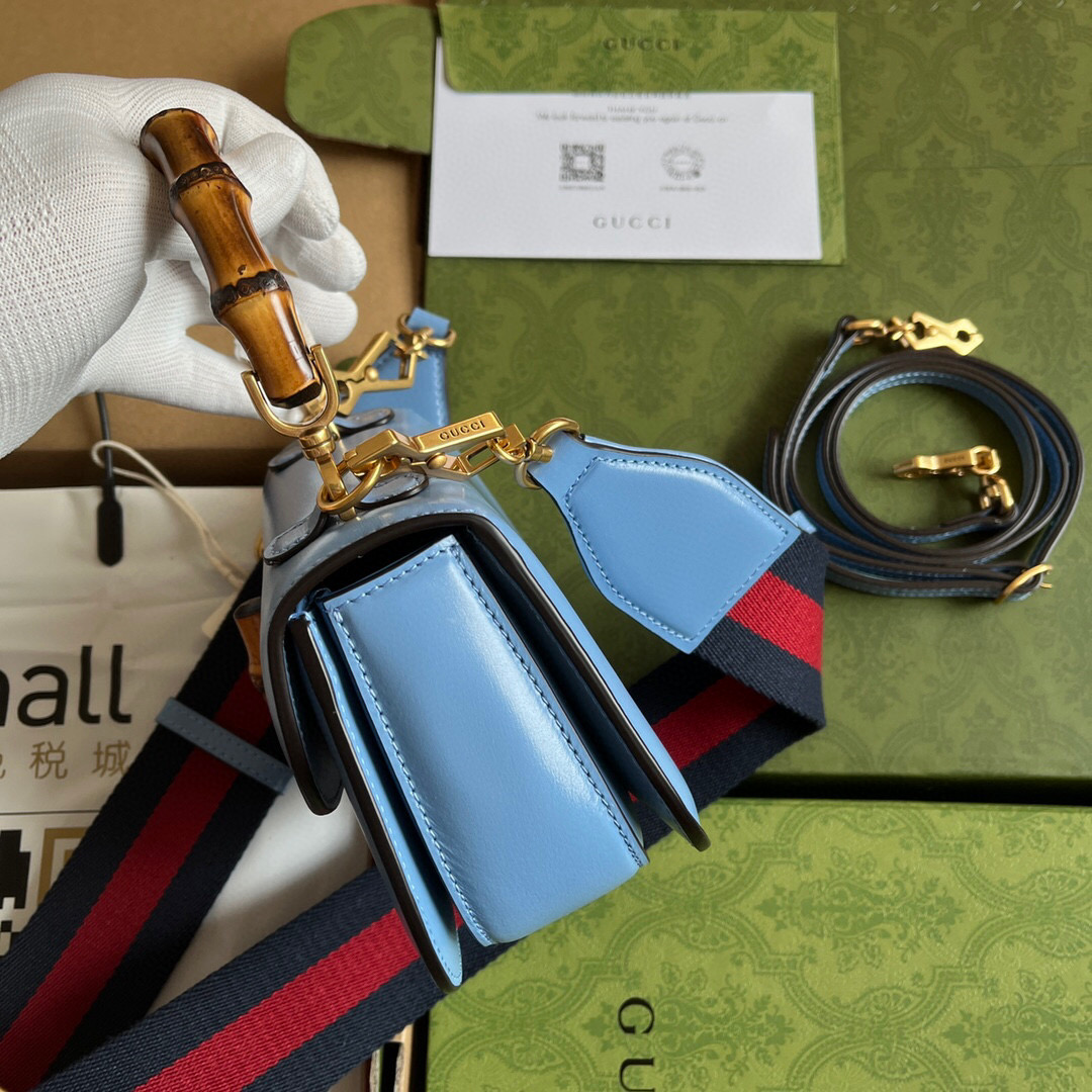 G*u*i bamboo handle bag