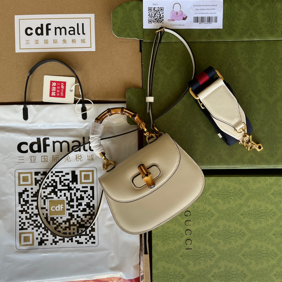 G*u*i bamboo handle bag