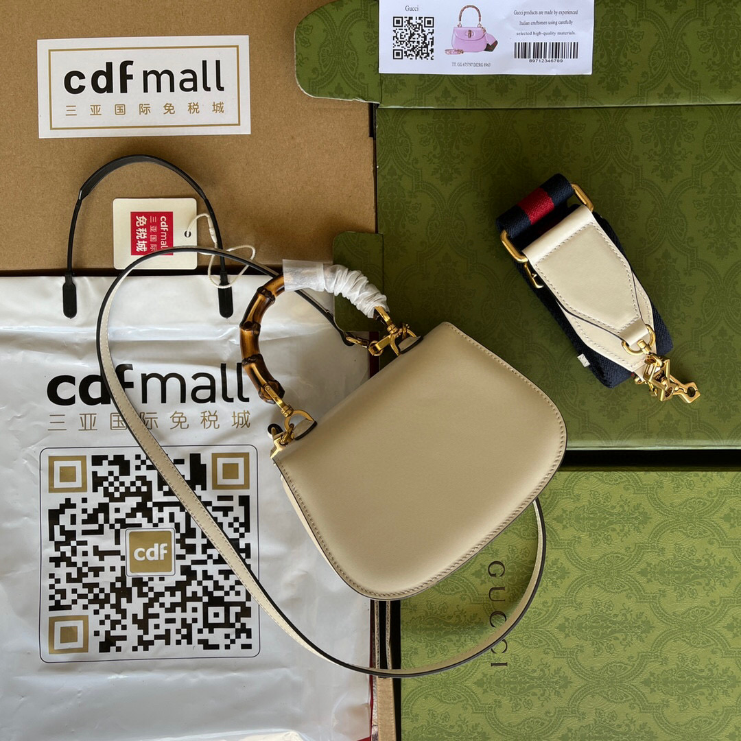 G*u*i bamboo handle bag