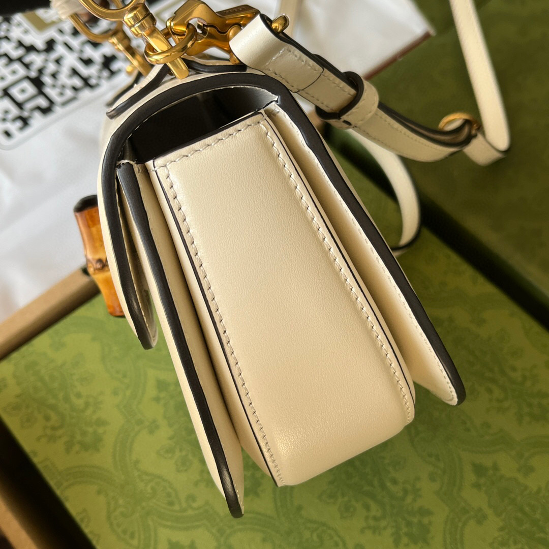G*u*i bamboo handle bag