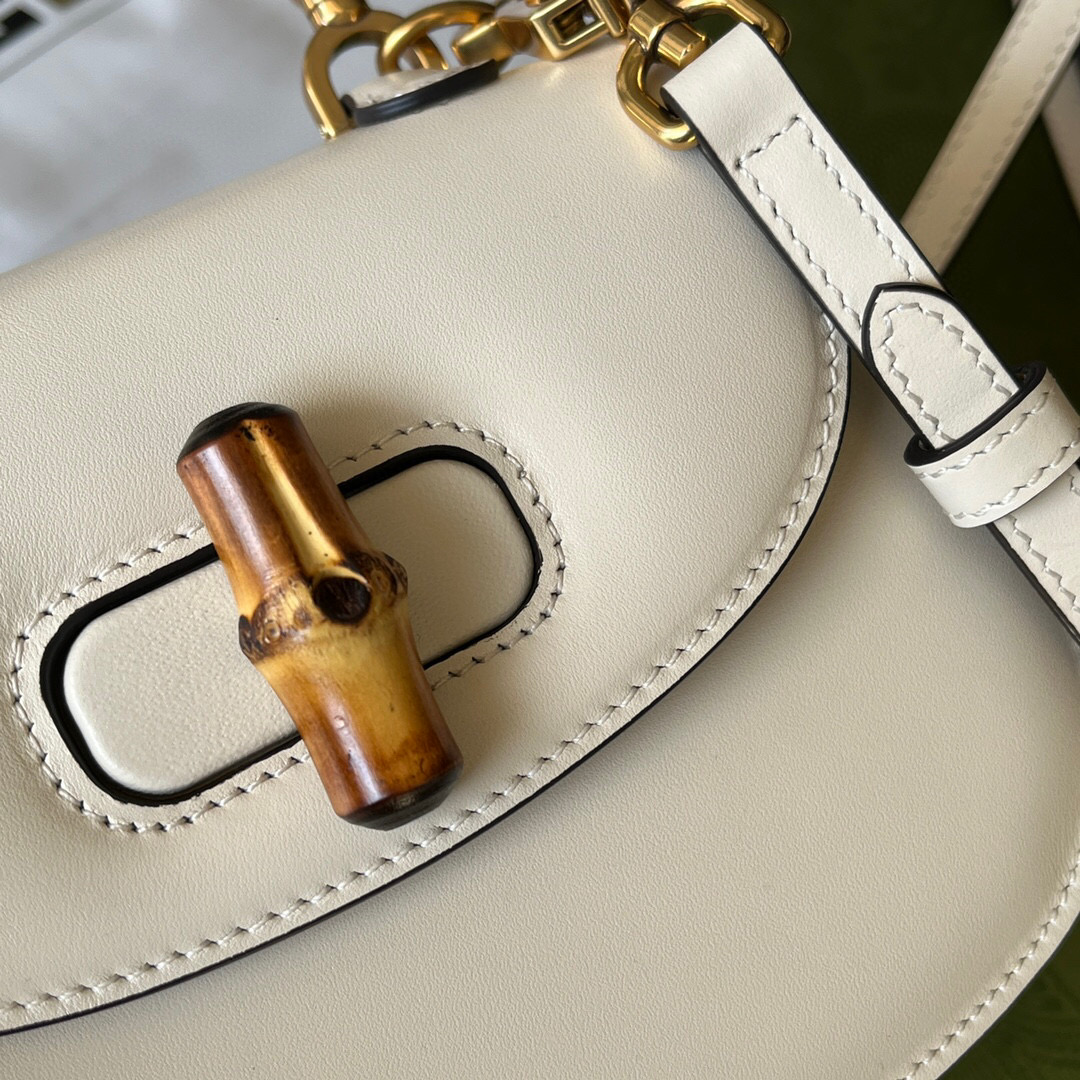 G*u*i bamboo handle bag