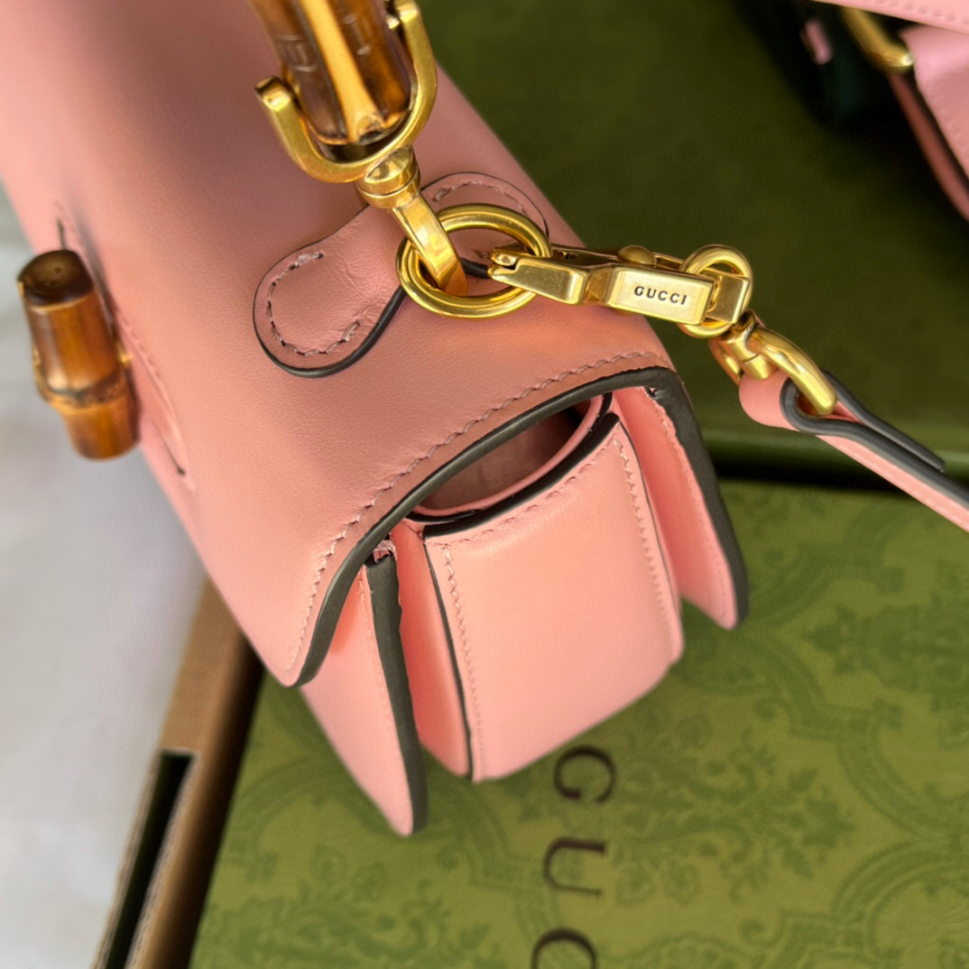 G*u*i bamboo handle bag