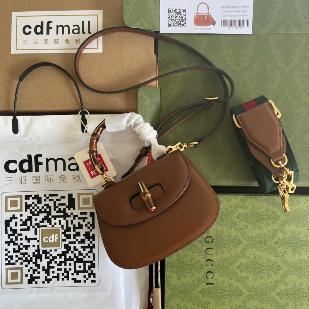 G*u*i bamboo handle bag