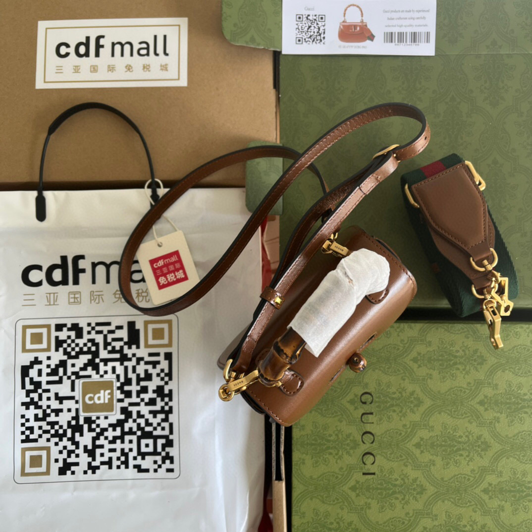 G*u*i bamboo handle bag