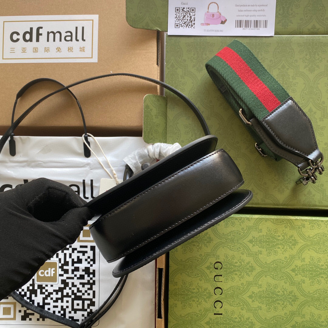 G*u*i bamboo handle bag