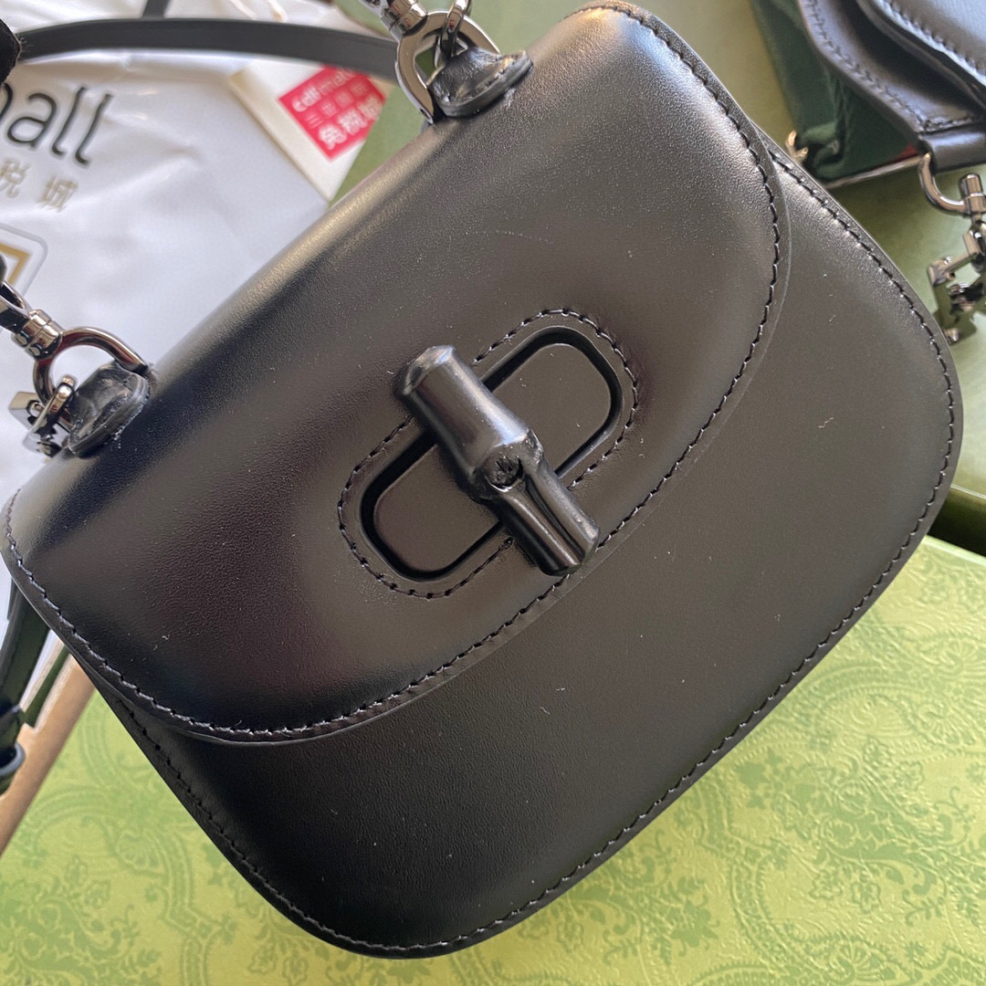 G*u*i bamboo handle bag