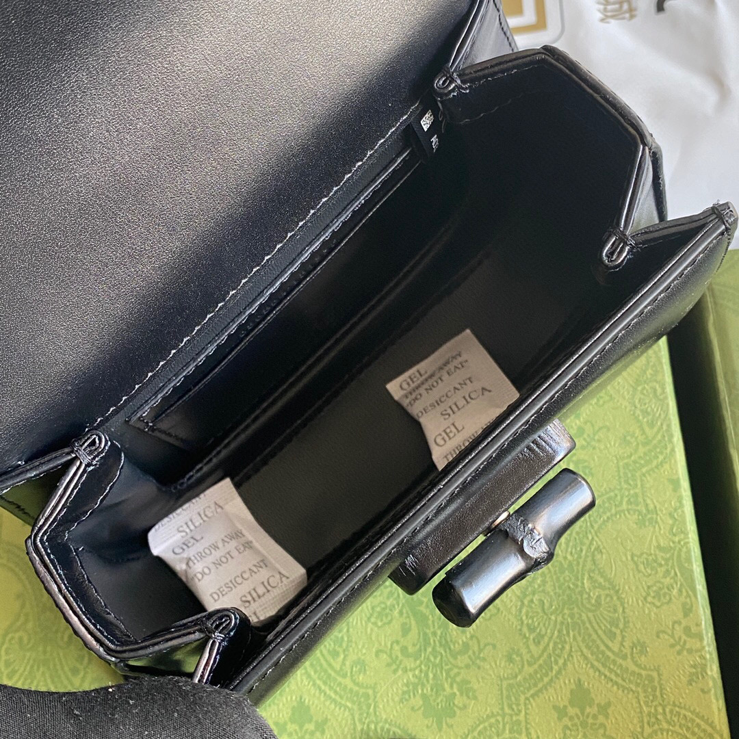 G*u*i bamboo handle bag