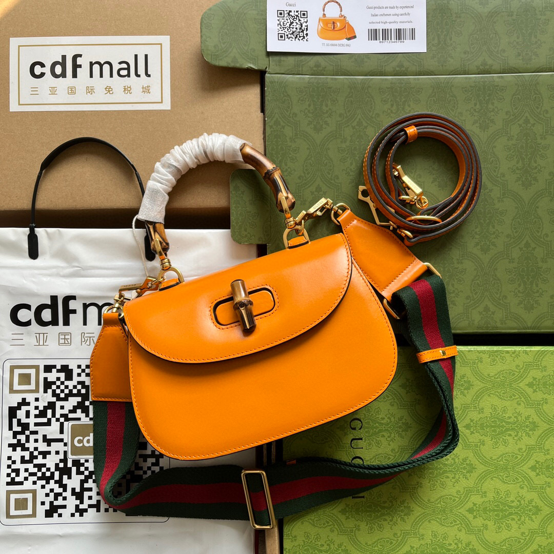 G*u*i bamboo handle bag