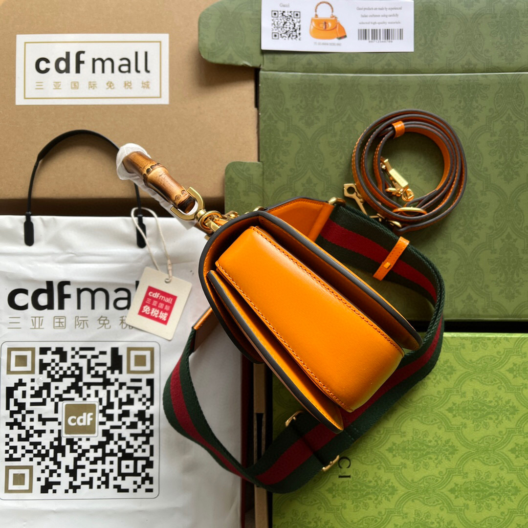 G*u*i bamboo handle bag