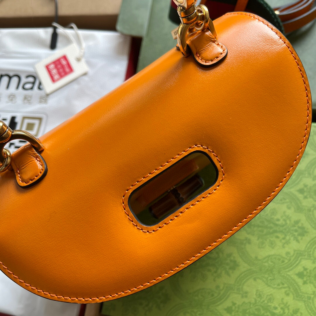 G*u*i bamboo handle bag