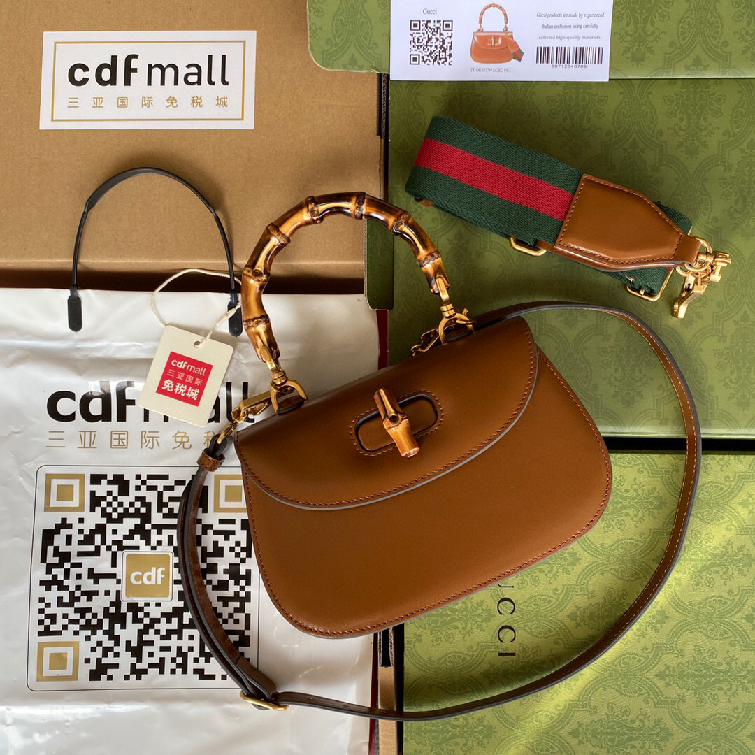 G*u*i bamboo handle bag