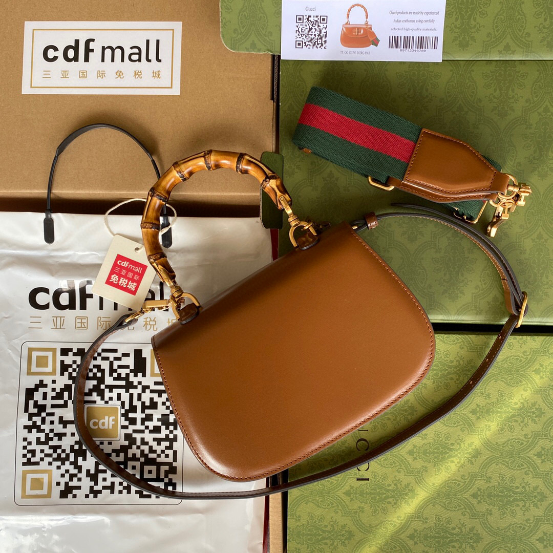 G*u*i bamboo handle bag