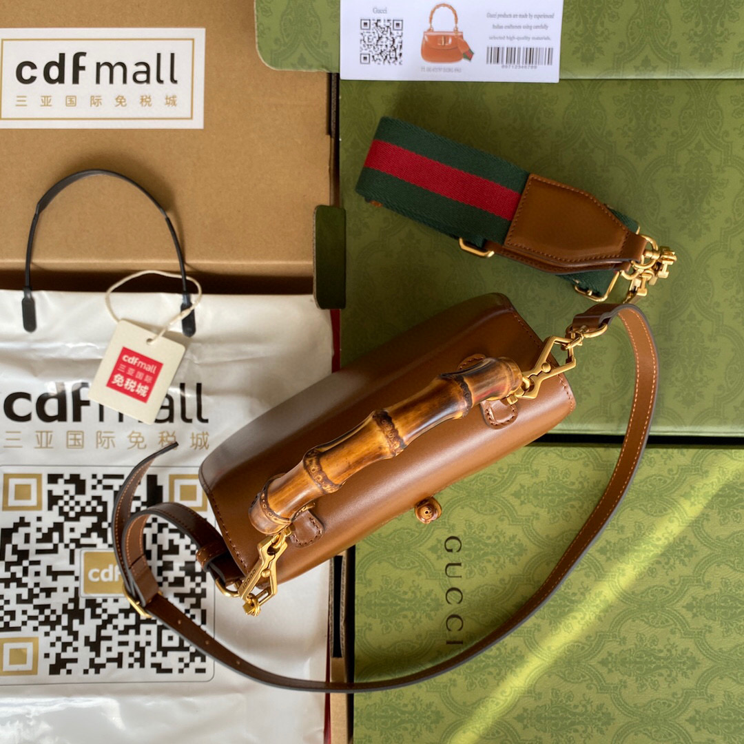 G*u*i bamboo handle bag
