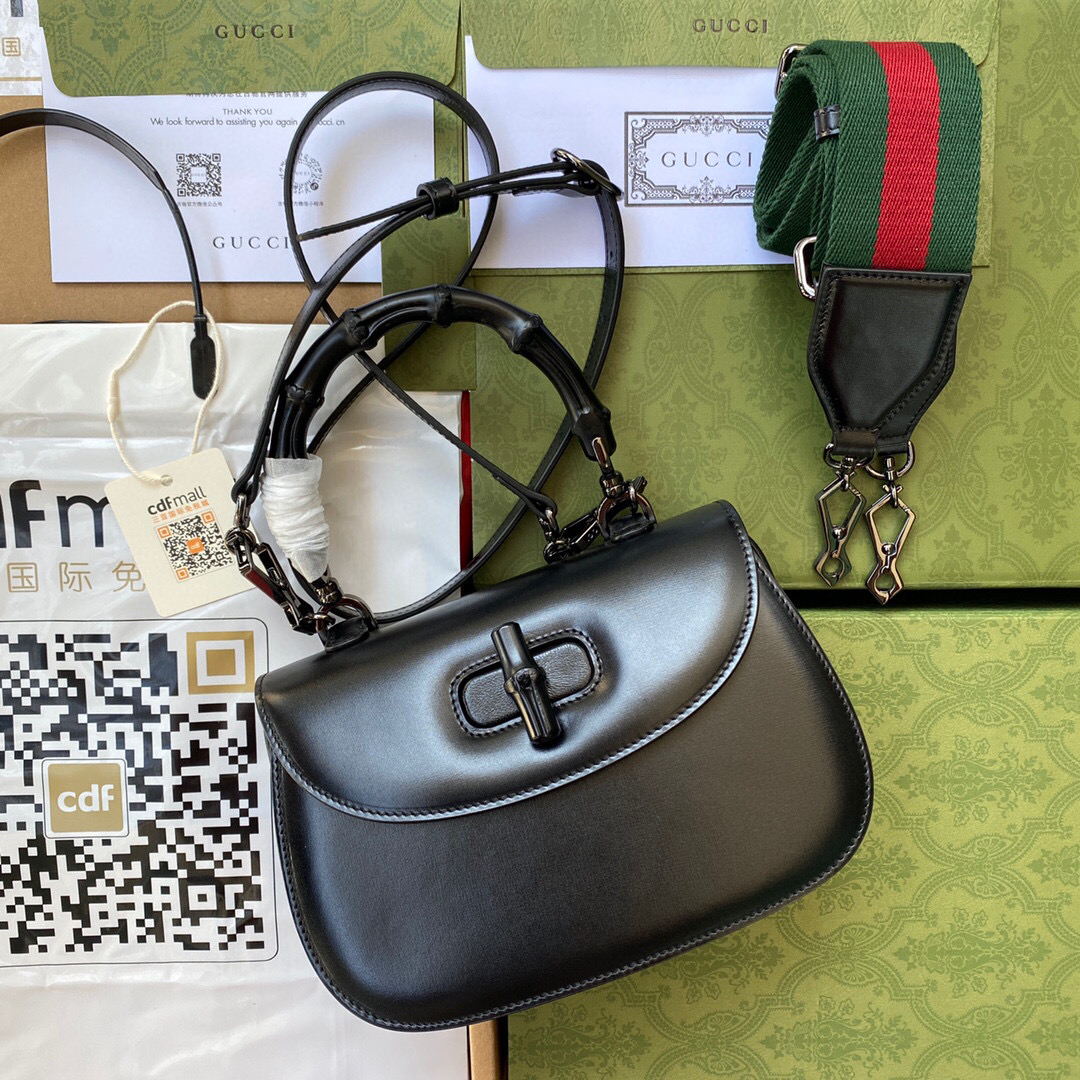 G*u*i bamboo handle bag