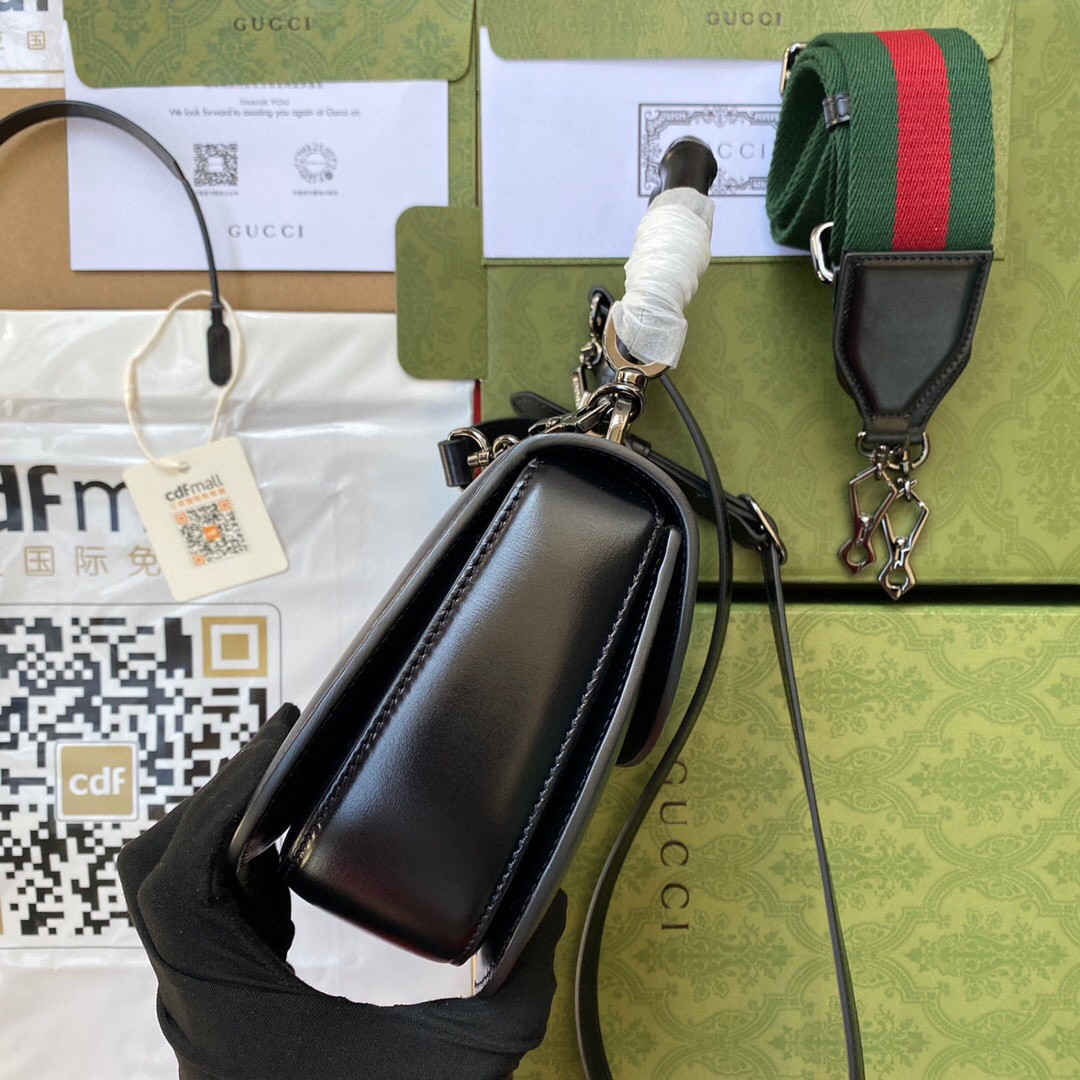 G*u*i bamboo handle bag
