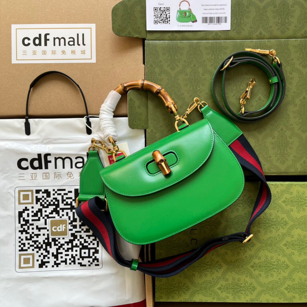G*u*i bamboo handle bag
